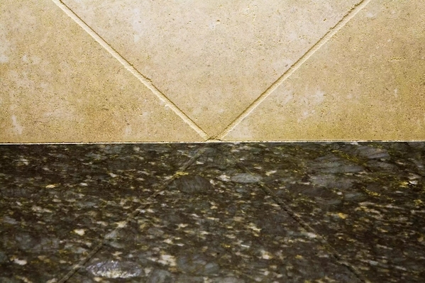 granite-countertop-and-tile-wall-150207564-5b705dfd46e0fb0025624d4c (800x533).jpg